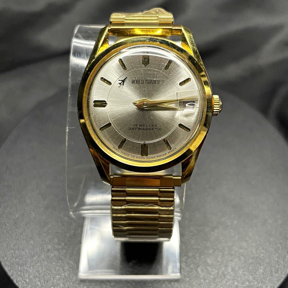 World Trader Vintage Manual Wind 17J Date Gold Tone Sunburst Silver Dial 35.5mm